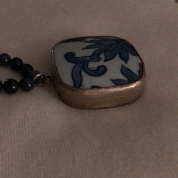 South Moon Under necklace with flower medallion. - Picture 5 of 5